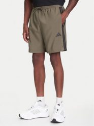 Adidas Szorty sportowe Essential 3-Stripes Chelsea JE6434 Khaki Regular Fit. Brązowe szorty sportowe męskie ADIDAS, bez wzorów, z syntetyku, sportowe. Za 89.99 zł.