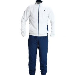 Lacoste Sport TRACKSUIT Dres white/inkwell/armour/papeete. Białe komplety dresowe męskie Lacoste Sport, z dresówki, sportowe. Za 929.00 zł.