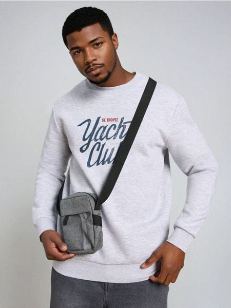 Saszetka - szary. Szare saszetki męskie Sinsay, bez wzorów, sportowe, małe. Za 19.99 zł.