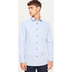 Koszula slim fit - Niebieski. Niebieskie koszule męskie Reserved. Za 99.99 zł.