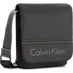 Saszetka CALVIN KLEIN - Matthew 2.0 Reporter K50K503701 001. Saszetki męskie marki Calvin Klein. W wyprzedaży za 239.00 zł.
