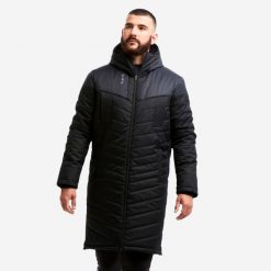 Długa parka do piłki nożnej. Czarne parki męskie KIPSTA, l, bez wzorów, bez kaptura. Za 349.99 zł.