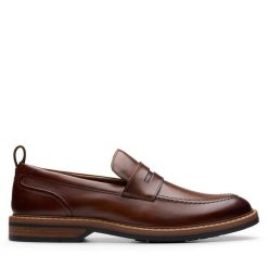 Mokasyny Clarks. Brązowe mokasyny męskie Clarks, bez zapięcia. Za 399.99 zł.