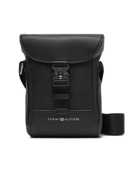 Tommy Hilfiger Saszetka Th Modern Flap Mini Reporter AM0AM13940 Czarny. Czarne saszetki męskie Tommy Hilfiger, bez wzorów, ze skóry. Za 239.99 zł.