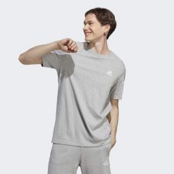 Koszulka sportowa męska adidas Essentials. Białe t-shirty sportowe męskie ADIDAS, m, bez wzorów, sportowe, bez ramiączek. Za 96.00 zł.
