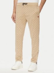Guess Spodnie dresowe Korbin Z2BB05 FL04Q Beżowy Regular Fit. Brązowe spodnie dresowe męskie Guess, z aplikacjami, z dresówki. Za 389.99 zł.