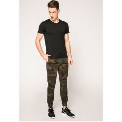 Jack & Jones - Spodnie Vega. Szare spodnie na co dzień męskie Jack & Jones, bez wzorów, z bawełny, casualowe. W wyprzedaży za 89.90 zł.