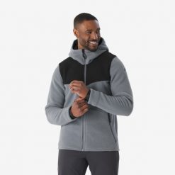 Polar turystyczny męski Quechua NH500 Warm. Czarne bluzy z polaru męskie QUECHUA, l, bez wzorów, z dzianiny, sportowe, bez ramiączek, z kapturem. Za 169.99 zł.