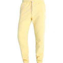Soulland FRANK DRAWSTRING Spodnie treningowe light yellow. Żółte spodnie dresowe męskie marki Soulland, z bawełny. W wyprzedaży za 367.20 zł.