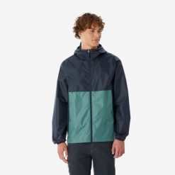 Kurtka turystyczna męska Quechua Raincut zamek wodoodporna. Niebieskie kurtki męskie QUECHUA, m, bez wzorów, z materiału, sportowe, bez ramiączek, bez kaptura. Za 69.99 zł.