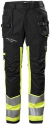 Reflective trousers HELLY HANSEN Fyre CL 1, yellow C58. Żółte długie spodnie sportowe męskie Helly Hansen, bez wzorów. Za 821.49 zł.