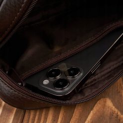 Paolo Peruzzi Skórzana saszetka męska do ręki brązowa pojemna T-130-BR. Brązowe saszetki męskie Paolo Peruzzi, bez wzorów. Za 178.58 zł.