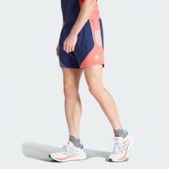 Szorty Own The Run Colorblock. Czerwone buty do biegania męskie ADIDAS, bez wzorów, z materiału, bez zapięcia, na fitness i siłownię. W wyprzedaży za 136.05 zł.
