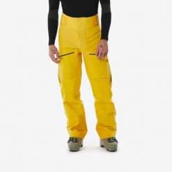 Spodnie narciarskie męskie Wedze FR500. Brązowe spodnie narciarskie i snowboardowe męskie WED'ZE, bez wzorów, z materiału, narciarskie. Za 599.99 zł.