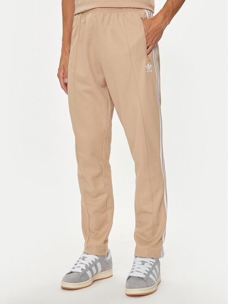 Adidas Spodnie dresowe adicolor Classics Beckenbauer IZ1857 Beżowy Slim Fit. Brązowe spodnie dresowe męskie ADIDAS, bez wzorów, z bawełny. Za 169.99 zł.