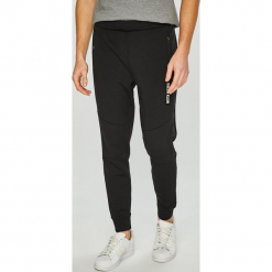 Calvin Klein Performance - Spodnie. Szare długie spodnie sportowe męskie Calvin Klein Performance, z dzianiny. Za 499.90 zł.