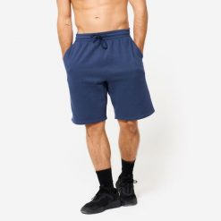 Spodenki fitness męskie Domyos. Niebieskie szorty sportowe męskie DOMYOS, bez wzorów, z włókna, sportowe. Za 69.99 zł.