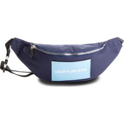 Saszetka nerka CALVIN KLEIN JEANS - Sp Essential+Street Pack K40K400803 Navy 453. Saszetki męskie marki Calvin Klein Jeans. W wyprzedaży za 249.00 zł.