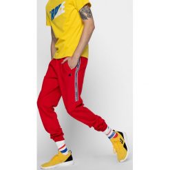Spodnie dresowe męskie SPMD209A - czerwony. Spodnie dresowe męskie marki 4f. Za 159.99 zł.