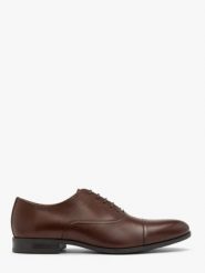 Brązowe wizytowe półbuty męskie. Brązowe eleganckie półbuty męskie Ryłko, ze skóry, klasyczne, bez obcasa, bez zapięcia. Za 479.99 zł.