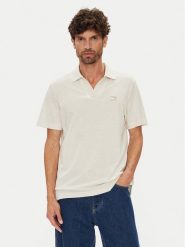 Tommy Jeans Polo Skipper DM0DM21657 Beżowy Regular Fit. Brązowe koszulki polo męskie Tommy Jeans, m, bez wzorów, z bawełny, bez kołnierzyka, bez ramiączek. Za 219.99 zł.