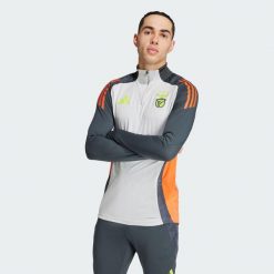 Bluza Benfica Tiro 24 Competition Training. Czerwone bluzy nierozpinane męskie ADIDAS, s, bez wzorów, z dresówki, sportowe, bez ramiączek, bez kaptura. W wyprzedaży za 286.95 zł.