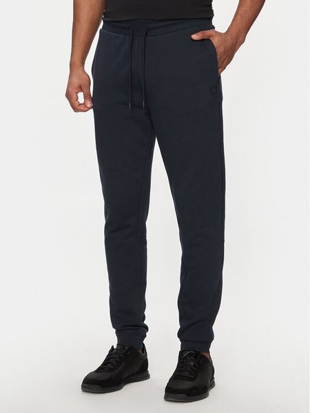 Boss Spodnie dresowe Sestart 50509303 Granatowy Regular Fit. Niebieskie spodnie dresowe męskie Boss, bez wzorów, z bawełny. Za 389.00 zł.
