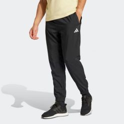 Spodnie dresowe męskie ADIDAS. Spodnie dresowe męskie ADIDAS, bez wzorów, z dresówki. Za 179.99 zł.