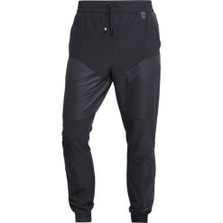 Under Armour UNSTOPPABLE GORE TAPERED Spodnie treningowe black. Długie spodnie sportowe męskie Under Armour. Za 419.00 zł.