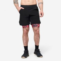 Spodenki fitness cardio męskie Domyos 2 w 1. Czarne szorty sportowe męskie DOMYOS, bez wzorów, z elastanu, sportowe. Za 89.99 zł.