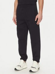 Armani Exchange Spodnie dresowe XM000354 AF10818 UB101 Granatowy Regular Fit. Niebieskie spodnie dresowe męskie Armani Exchange, bez wzorów, z bawełny. Za 329.99 zł.