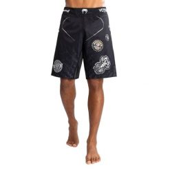 Spodenki treningowe męskie Venum X Tekken 8 - Paul Phoenix Fight Shorts. Czarne szorty sportowe męskie VENUM, bez wzorów, sportowe. Za 299.99 zł.