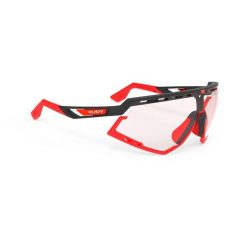 Okulary Rudy Project DEFENDER BLACK MATTE - Impactx™ Photochromic 2 Red. Czerwone okulary przeciwsłoneczne męskie Rudy Project, bez wzorów, sportowe. Za 836.99 zł.