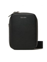 Calvin Klein Saszetka Ck Sleek Reporter Xs K50K512747 Czarny. Czarne saszetki męskie Calvin Klein, bez wzorów, ze skóry. Za 399.99 zł.