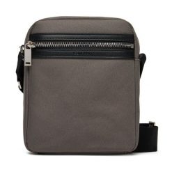 Saszetka Calvin Klein. Szare saszetki męskie Calvin Klein, bez wzorów, młodzieżowe, małe. Za 239.99 zł.