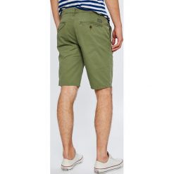 Quiksilver - Szorty. Żółte szorty męskie Quiksilver, bez wzorów, z bawełny, casualowe. W wyprzedaży za 129.90 zł.