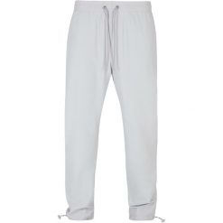 Spodnie dresowe Urban Classics Recycled GT. Szare spodnie dresowe męskie Urban Classics, bez wzorów, z dresówki. Za 252.00 zł.