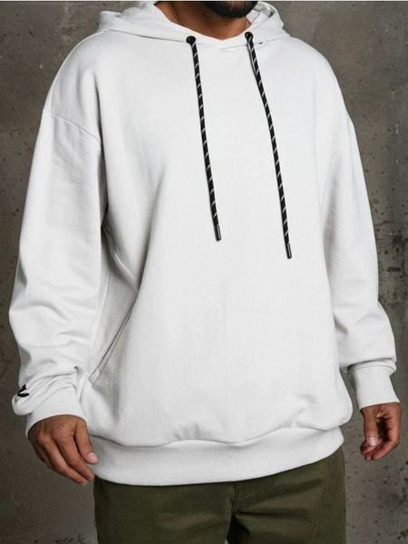 Bluza hoodie z kieszeniami - kremowy. Białe bluzy nierozpinane męskie Sinsay, l, bez wzorów, bez ramiączek, bez kaptura. Za 79.99 zł.