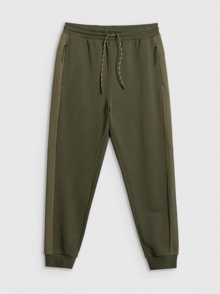 4F Spodnie dresowe joggery męskie - khaki XL. Brązowe spodnie dresowe męskie 4f, bez wzorów, z dresówki, długie. Za 159.99 zł.