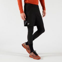 Spodenki - legginsy do tenisa 2w1 męskie Artengo Thermic. Czarne legginsy męskie ARTENGO, m, bez wzorów, krótkie, tenisowe. Za 149.99 zł.