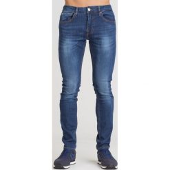 GRANATOWE JEANSY MIAMI GUESS. Niebieskie jeansy męskie Guess, z aplikacjami, z jeansu. Za 184.50 zł.