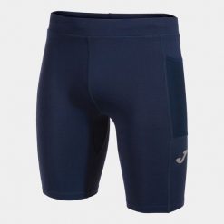 Legginsy Joma Elite X niebieskie do biegania. Niebieskie legginsy męskie Joma, bez wzorów, z poliamidu, do biegania. W wyprzedaży za 147.75 zł.