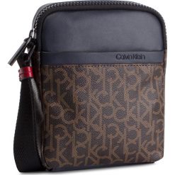 Saszetka CALVIN KLEIN - Ck Mono Mini Reporter K50K504347 908. Saszetki męskie Calvin Klein. W wyprzedaży za 239.00 zł.