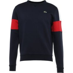 Lacoste Sport Bluza navy blue/whitelighthouse red. Niebieskie bluzy bez kaptura męskie Lacoste Sport, z bawełny. Za 419.00 zł.