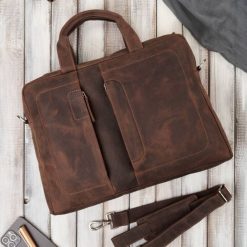 Skórzana torba męska na laptopa z uchwytem na walizkę brązowa vintage Paolo Peruzzi E-26-NBR. Brązowe torby na laptopa męskie bez wzorów, ze skóry. Za 329.00 zł.