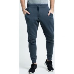 Under Armour - Spodnie. Długie spodnie sportowe męskie marki Under Armour. W wyprzedaży za 159.90 zł.