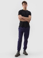 4F Spodnie casual joggery męskie - granatowe L. Niebieskie spodnie dresowe męskie 4f, bez wzorów, z bawełny, casualowe. W wyprzedaży za 89.99 zł.