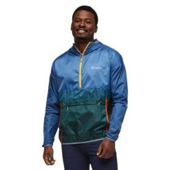 Polar z kapturem Cotopaxi Amado. Niebieskie bluzy z polaru męskie Cotopaxi, bez wzorów, z polaru, eleganckie, bez ramiączek, z kapturem. W wyprzedaży za 245.50 zł.