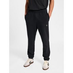 Spodnie do biegania Hummel Pulse. Czarne buty treningowe męskie HUMMEL, bez wzorów, z dresówki, bez zapięcia, do biegania. Za 170.00 zł.