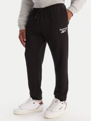 Reebok Spodnie dresowe Winslow RK25140CCM Czarny Regular Fit. Czarne spodnie dresowe męskie Reebok, bez wzorów, z bawełny. Za 199.99 zł.